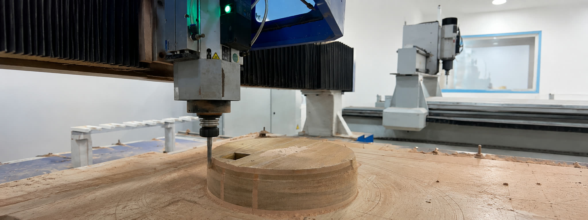CNC router cutting a pattern in the Metals of Bahrain tool room